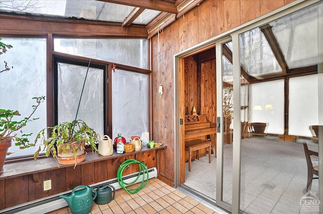 sunroom featuring a baseboard radiator