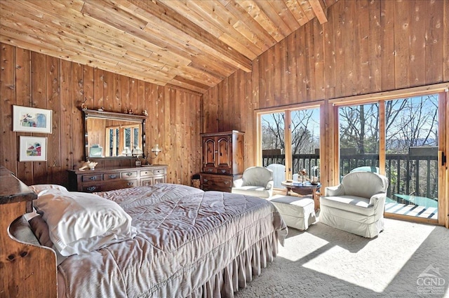 carpeted bedroom with wood walls, beamed ceiling, high vaulted ceiling, access to outside, and wooden ceiling