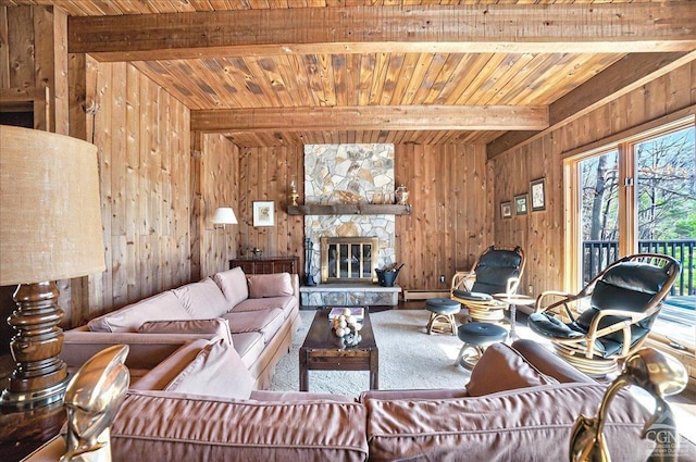 living room with wood walls, beam ceiling, and wooden ceiling
