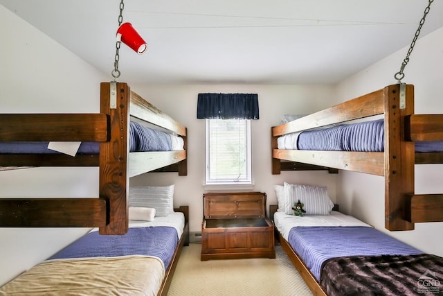 bedroom with light colored carpet