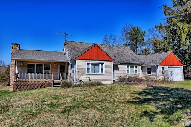 view of front of property with a chimney, a garage, covered porch, and a front yard