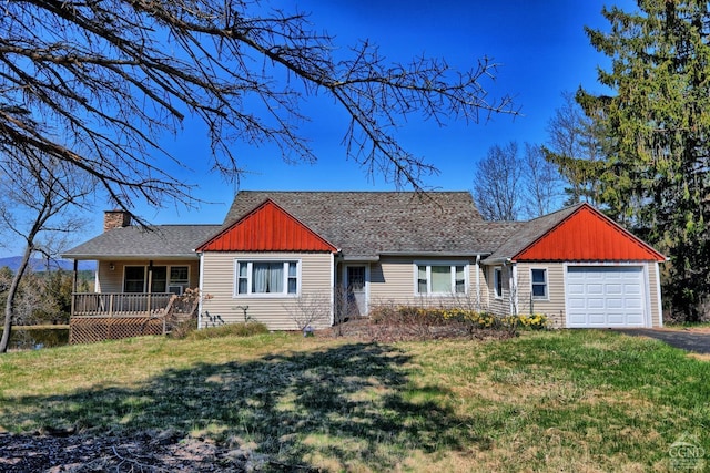 ranch-style home with a chimney, a garage, driveway, and a front yard