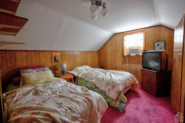 carpeted bedroom featuring cooling unit, vaulted ceiling, and wood walls