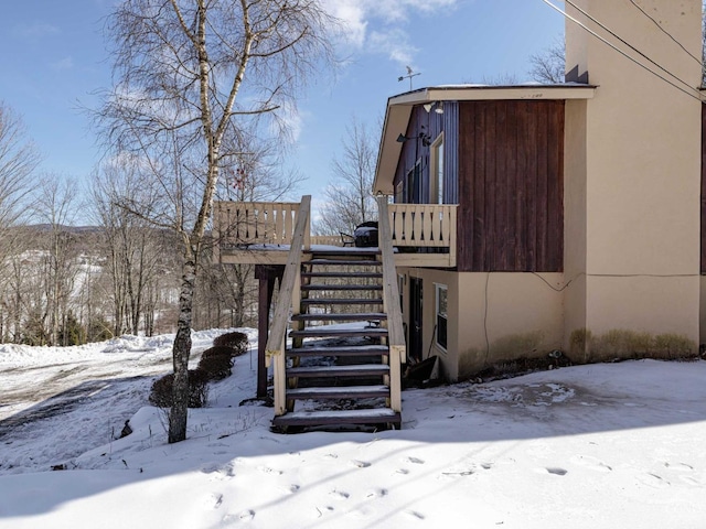 exterior space featuring a wooden deck