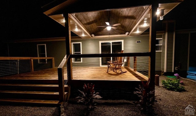 deck at night with ceiling fan