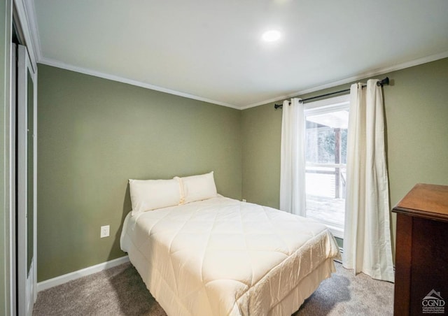 bedroom with carpet floors and ornamental molding