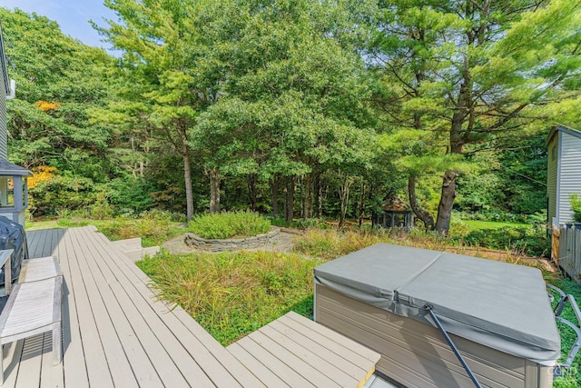 deck with a hot tub