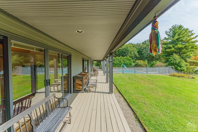 wooden deck with a yard