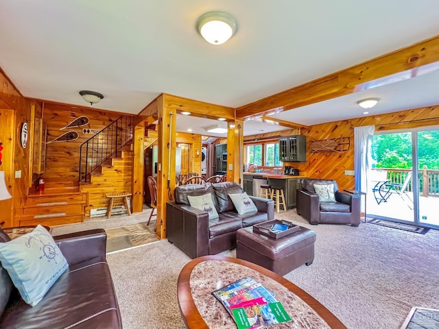 living room with carpet flooring and wooden walls