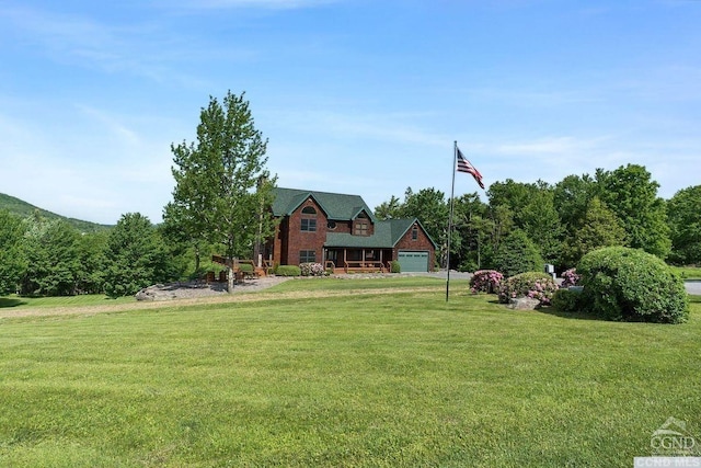 view of yard featuring a garage