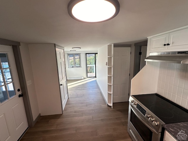 kitchen featuring dark wood-style flooring, tasteful backsplash, electric range, white cabinets, and under cabinet range hood