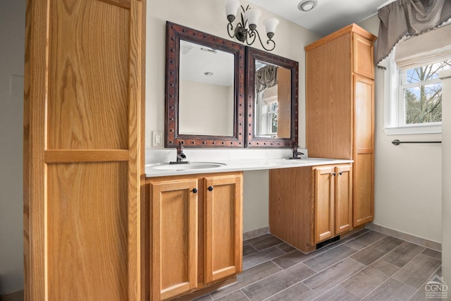 bathroom with hardwood / wood-style floors and vanity