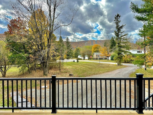 view of gate featuring a mountain view