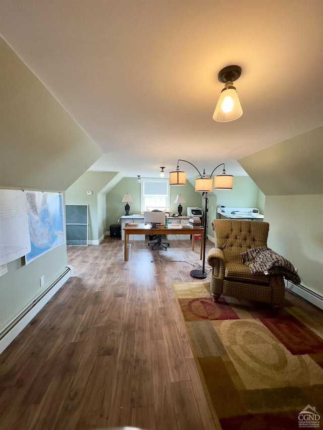interior space featuring a baseboard radiator, wood finished floors, and vaulted ceiling