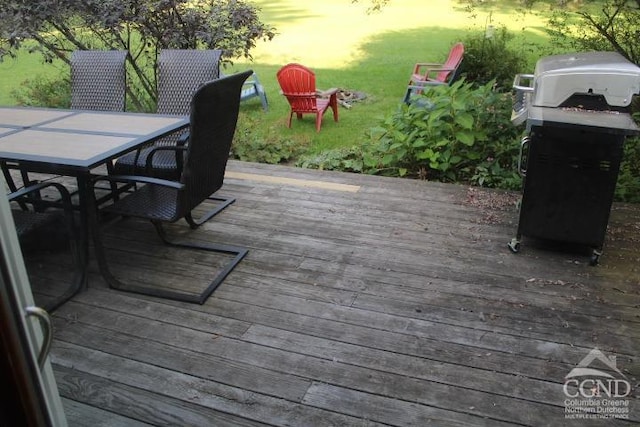 deck at dusk with a yard