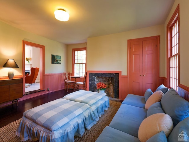 bedroom featuring a closet and dark wood-type flooring