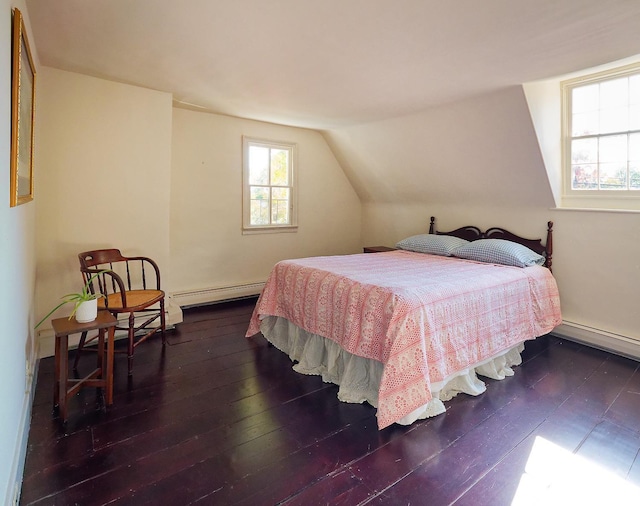 bedroom featuring lofted ceiling, a baseboard radiator, and dark hardwood / wood-style floors