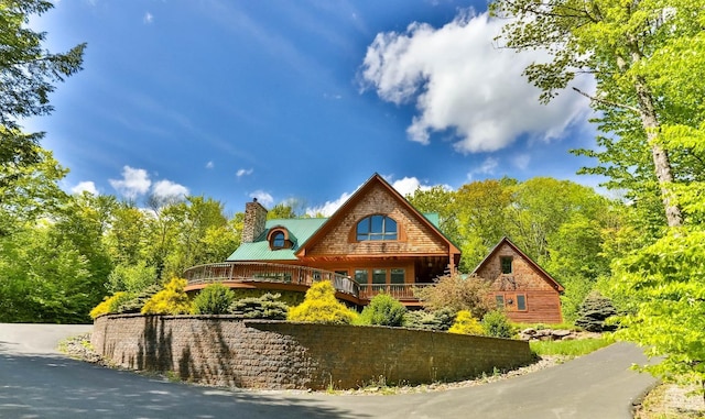 view of front of house with a deck