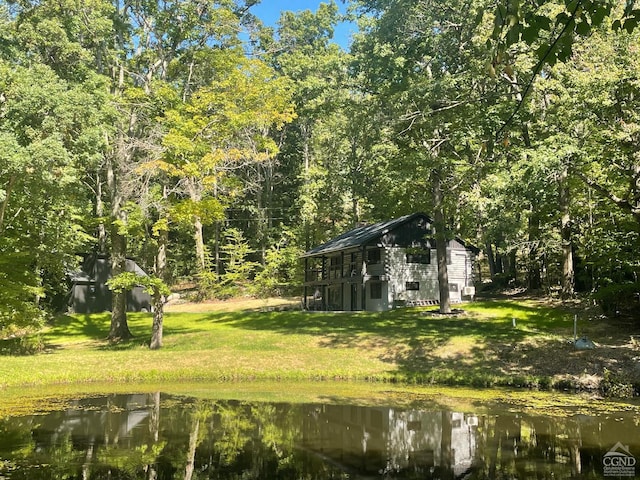 view of yard with a water view