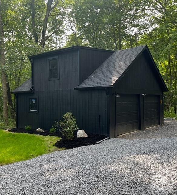 view of property exterior featuring a garage