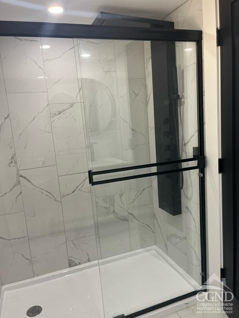 bathroom with an enclosed shower