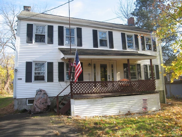 colonial home with covered porch