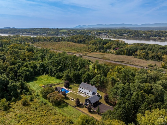 aerial view featuring a water and mountain view