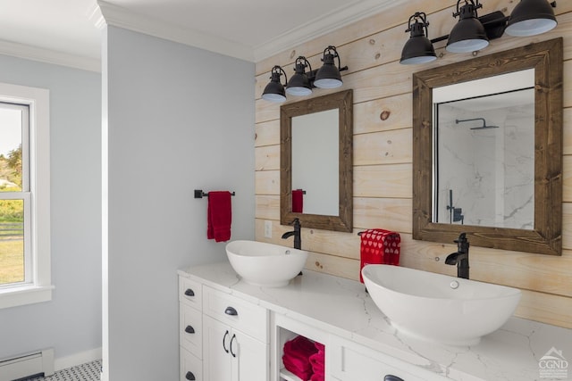 bathroom with baseboard heating, a wealth of natural light, and ornamental molding