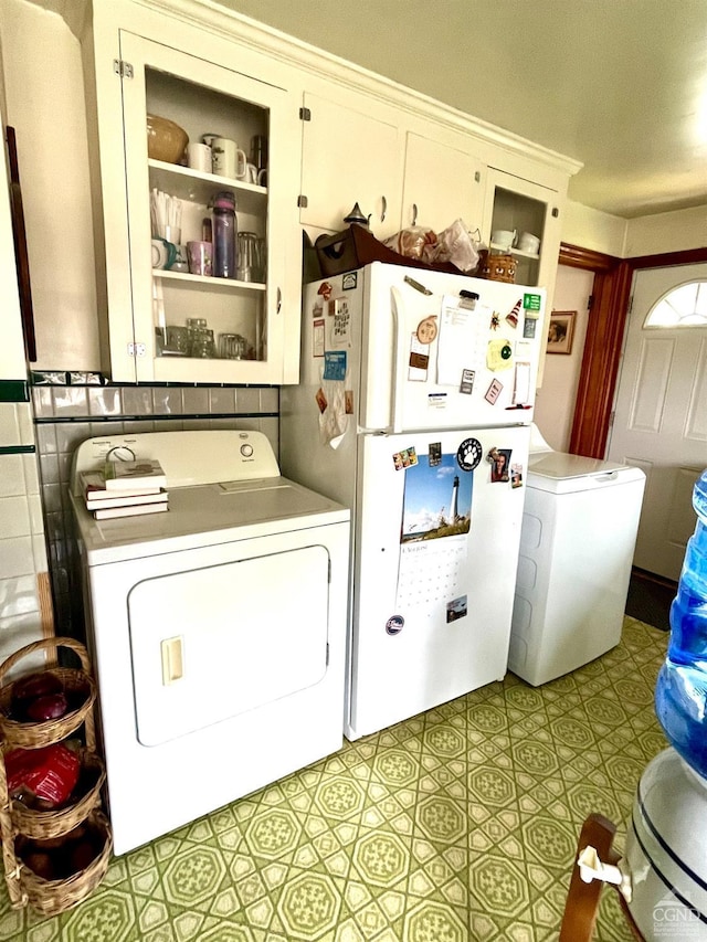 washroom featuring washer / dryer