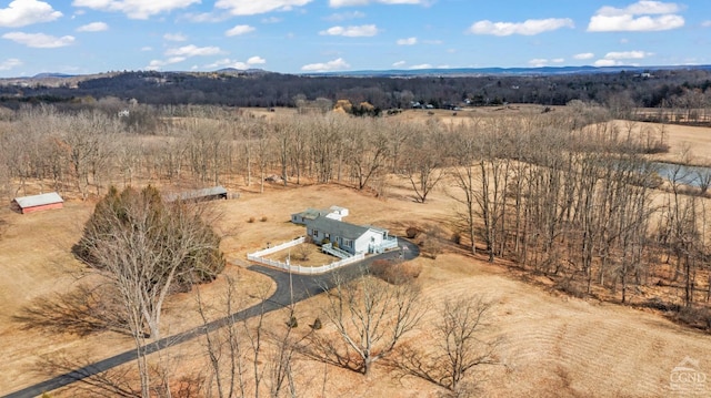 birds eye view of property with a rural view and a forest view