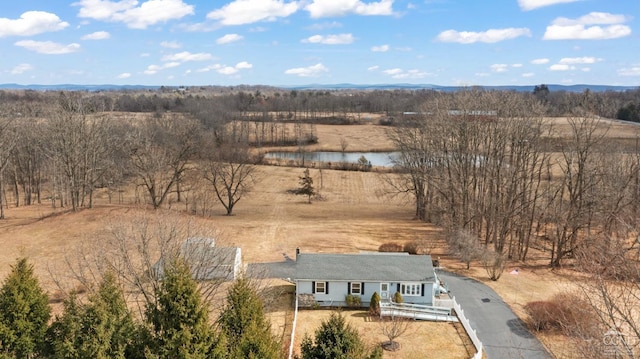 drone / aerial view featuring a rural view and a water view