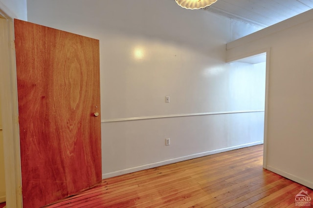 spare room with light hardwood / wood-style floors