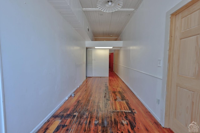 hall with wood-type flooring