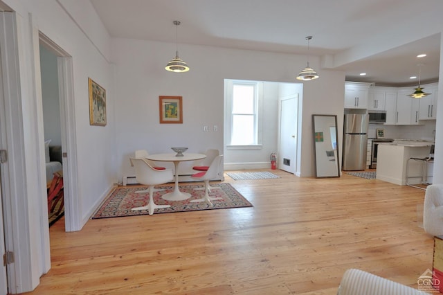 dining area featuring light hardwood / wood-style floors