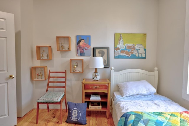 bedroom featuring hardwood / wood-style floors