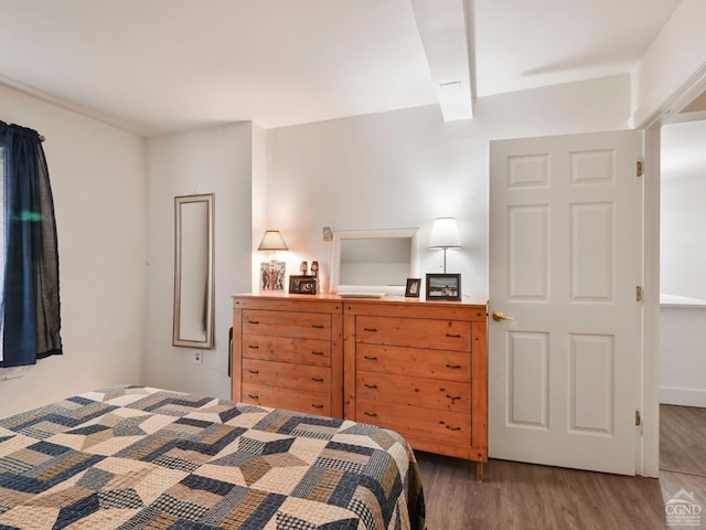 bedroom with wood-type flooring