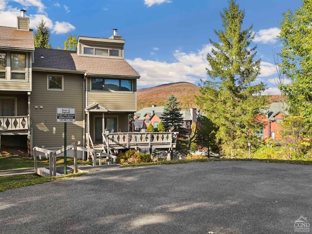 view of building exterior with a mountain view