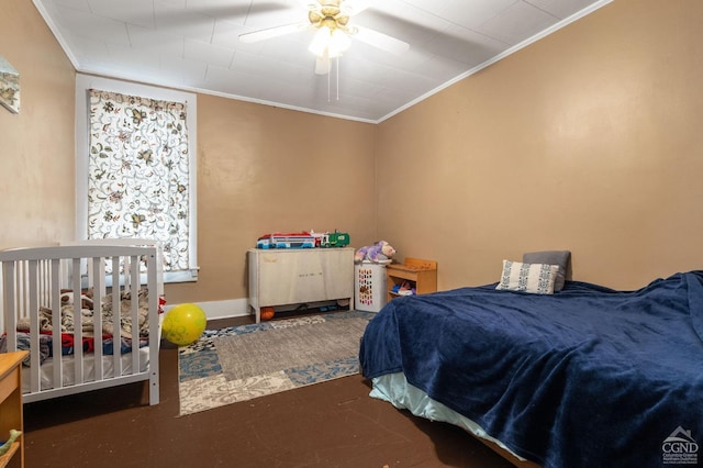 bedroom featuring ceiling fan and ornamental molding