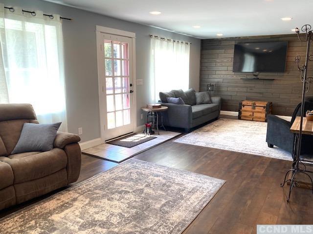 living room with hardwood / wood-style flooring