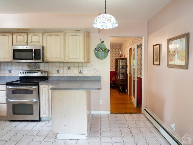 kitchen with appliances with stainless steel finishes, backsplash, a baseboard radiator, light hardwood / wood-style floors, and hanging light fixtures