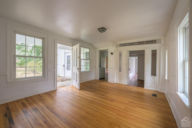 interior space featuring visible vents and light wood-style flooring