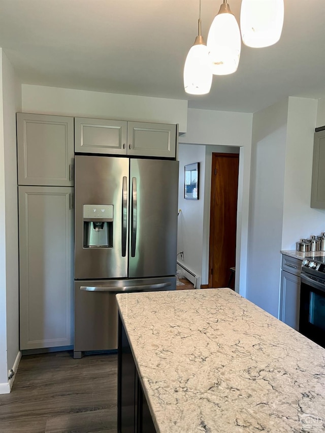 kitchen with stainless steel fridge, dark wood-style floors, gray cabinets, electric range, and light stone counters