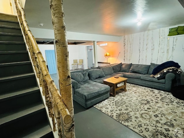 living room featuring concrete flooring