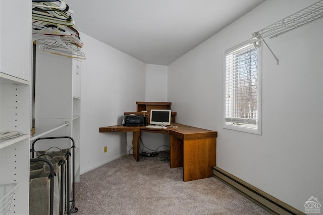 office area featuring a baseboard radiator and light carpet