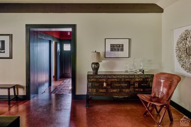 living area featuring concrete flooring