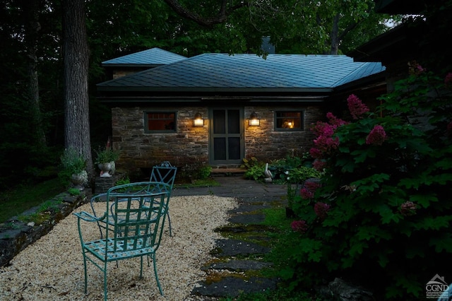 back of house with a patio area