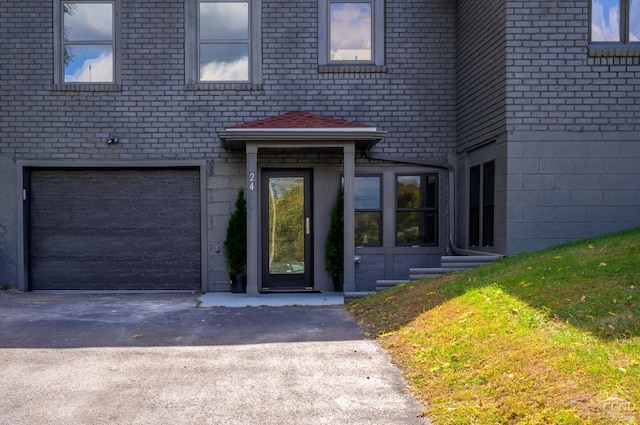 entrance to property with a garage