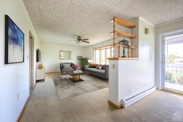 unfurnished living room with ceiling fan, carpet floors, crown molding, and a baseboard radiator