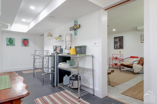 interior space with recessed lighting and baseboards