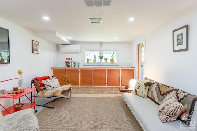 living area featuring recessed lighting, light colored carpet, visible vents, and a wall unit AC